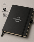 Black notebook with 'Your Branding Here' text on a light gray background