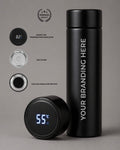 Black insulated bottle with digital temperature display and branding area on a gray background